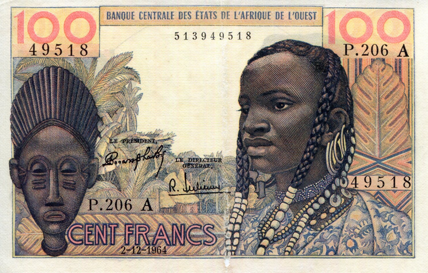 Ivory Coast 100 Francs VF+ (see large image) Tear into note pick #: 101Ad
